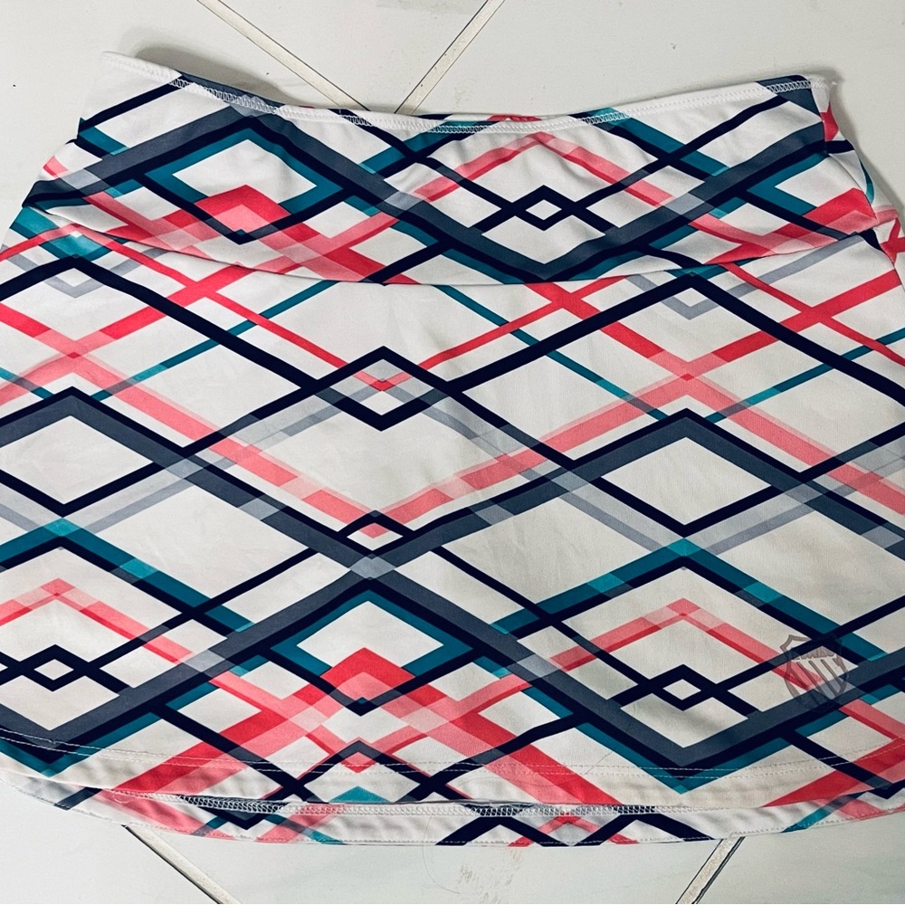K-Swiss White Mini Skirt with Coral, Teal & Navy Geometric Print